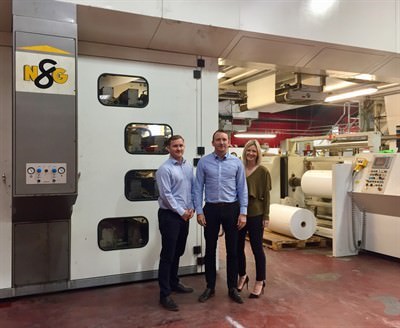 Directors in front of new Printing press