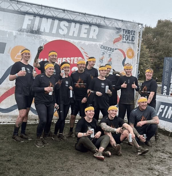 Duo Packaging team completing their charity challenge at Tough Mudder in Heaton Park.